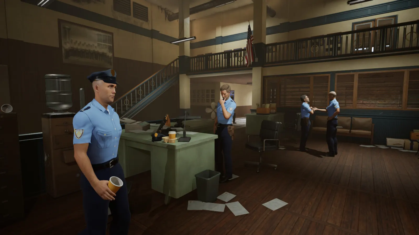 Four uniformed officers gather in the main hall of the Winston Springs police station